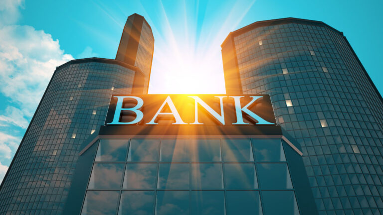 Buildings with Bank marquee, sunburst