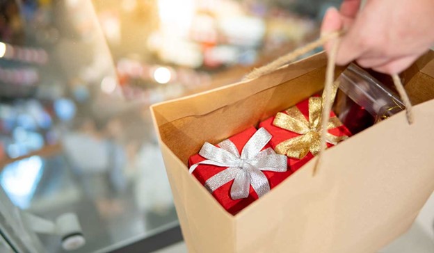 holiday presents in shopping bag