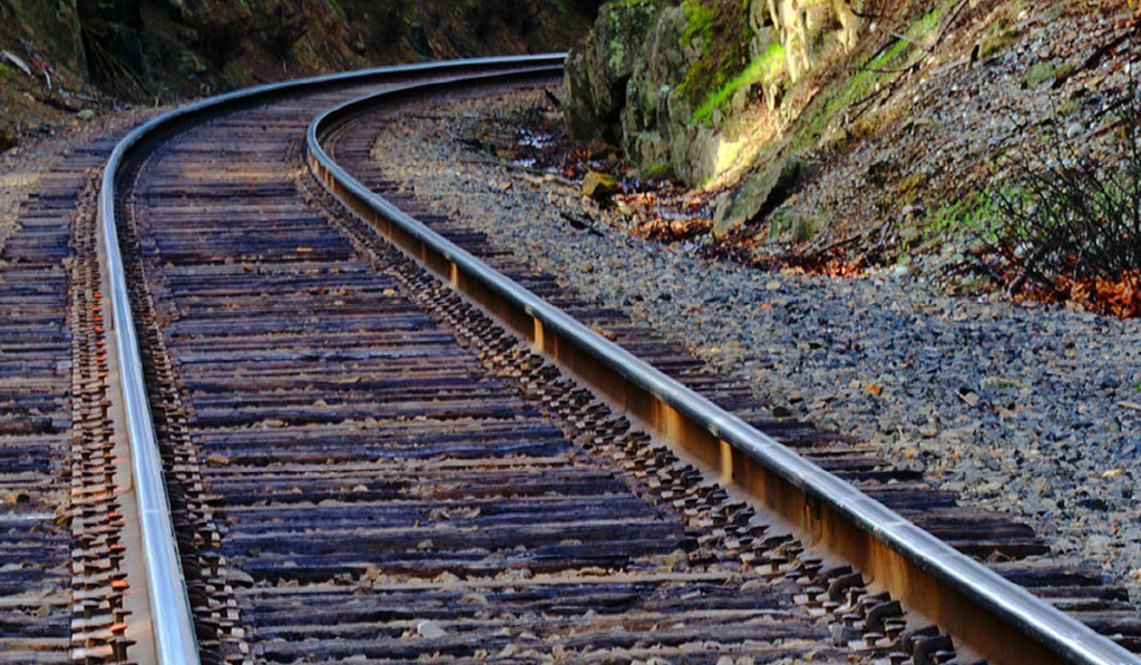rail tracks curving out of sight