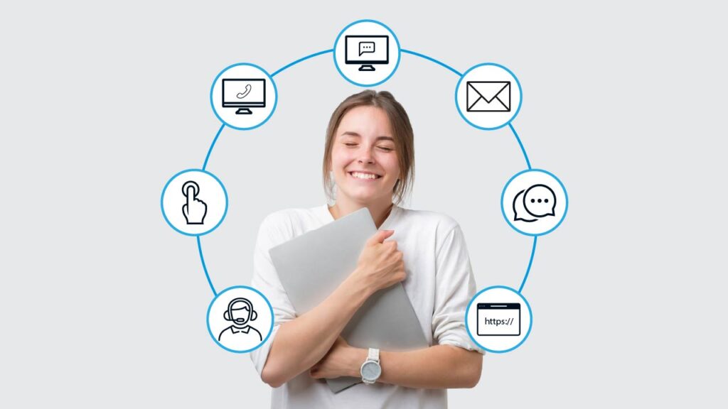 Happy woman clutching laptop amid omnichannel icons